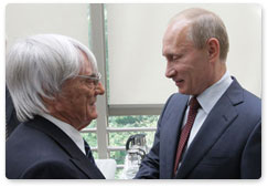 Prime Minister Vladimir Putin meets with Formula One CEO Bernie Ecclestone