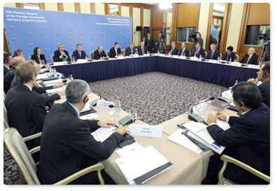 Prime Minister Vladimir Putin leads a meeting of the Foreign Investment Advisory Council