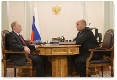 Prime Minister Vladimir Putin meets with head of the Federal Taxation Service Mikhail Mishustin