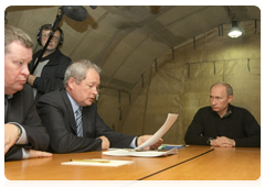Prime Minister Vladimir Putin, currently on a working trip to the Southern Federal District, chairs a meeting in the town of Novomikhailovsky regarding disaster recovery efforts in the Krasnodar Territory|22 october, 2010|20:22