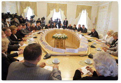 Prime Minister Vladimir Putin addresses a meeting of executives of the St Petersburg and Leningrad Region Federation of Trade Unions