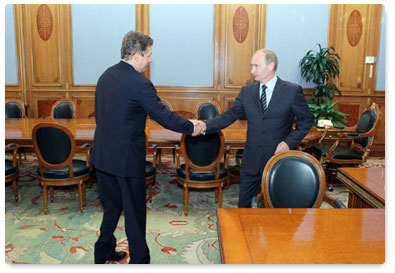 Prime Minister Vladimir Putin holds a meeting with Gazprom CEO Alexei Miller