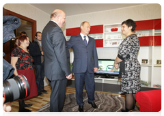 Prime Minister Vladimir Putin visiting one of the new houses in  the village of Verkhnyaya Vereya|1 november, 2010|18:11