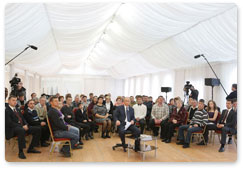 Prime Minister Vladimir Putin holds a video conference with heads of the regions affected by wildfires in the village of Verkhnyaya Vereya