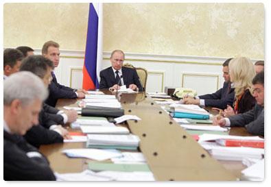 Prime Minister Vladimir Putin chairs a meeting of the Government Presidium