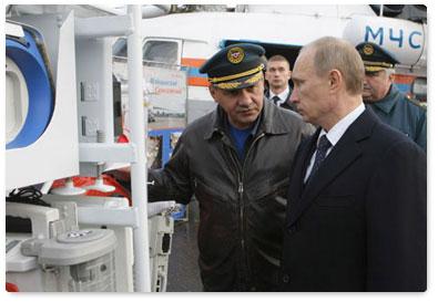 Prime Minister Vladimir Putin visits the Civil Defence Academy at the Emergencies Ministry to examine firefighting equipment