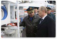 Prime Minister Vladimir Putin visits the Civil Defence Academy at the Emergencies Ministry to examine firefighting equipment