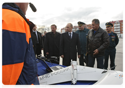 Prime Minister Vladimir Putin visiting the Civil Defence Academy at the Emergencies Ministry where he examined firefighting equipment|12 november, 2010|16:55