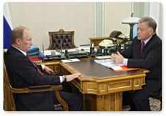 Prime Minister Vladimir Putin at a meeting with CEO of the Russian Railways Vladimir Yakunin