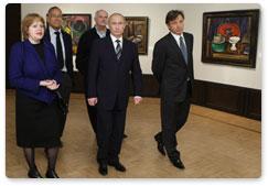 Prime Minister Vladimir Putin visits an exhibition of Petr Konchalovsky, one of the initiators of avant-garde in Russia, in the Tretyakov Gallery