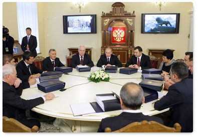 Prime Minister Vladimir Putin attends a limited attendance meeting of CIS delegation heads