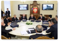 Prime Minister Vladimir Putin attends a limited attendance meeting of CIS delegation heads