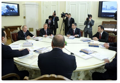 Prime Minister Vladimir Putin takes part in a limited attendance meeting of the EurAsEC Interstate Council