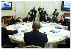 Prime Minister Vladimir Putin takes part in a limited attendance meeting of the EurAsEC Interstate Council