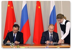 Russia and China sign a series of cooperation deals following intergovernmental talks