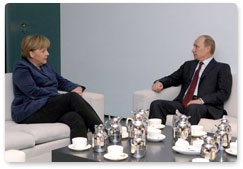 Prime Minister Vladimir Putin holds talks with German Chancellor Angela Merkel
