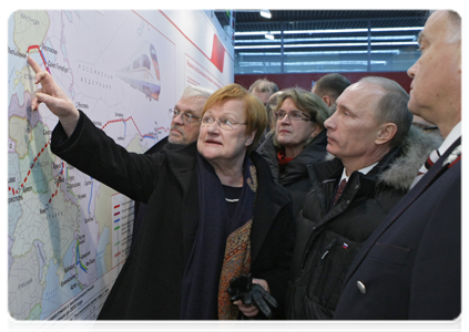 Prime Minister Vladimir Putin and Finnish President Tarja Halonen upon arriving in St Petersburg on the new Allegro high-speed train|12 december, 2010|18:51