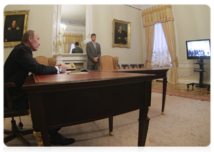 Prime Minister Vladimir Putin holding a video conference with officials at the Sayano-Shushenskaya hydroelectric power station to celebrate the restoration of power unit No. 3 after a recent accident|22 december, 2010|16:30