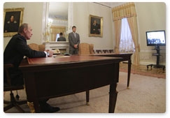 On a working visit to St Petersburg, Prime Minister Vladimir Putin holds a video conference with officials at the Sayano-Shushenskaya hydroelectric power station to celebrate the restoration of power unit No. 3 after a recent accident