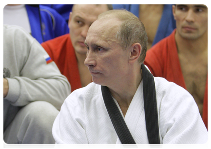 Prime Minister Putin talking with the Russian wrestling team after their training session|22 december, 2010|22:39