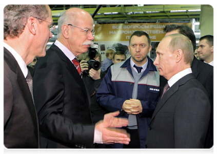 Prime Minister Vladimir Putin talking with Daimler AG Chairman of the Board Dieter Zetsche during his visit to the GAZ Group|23 december, 2010|18:23