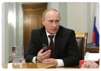 Prime Minister Putin during a working meeting with Deputy Prime Minister Sergei Ivanov and AFK Sistema Chairman of the Board Vladimir Yevtushenkov|28 december, 2010|22:53