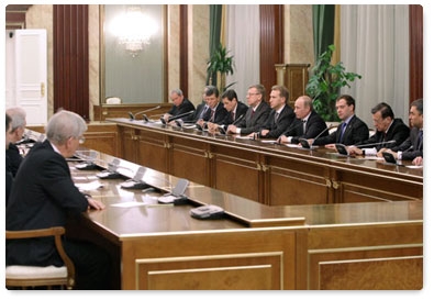 President Dmitry Medvedev and Prime Minister Vladimir Putin attend a Government meeting