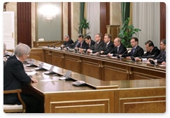 President Dmitry Medvedev and Prime Minister Vladimir Putin attend a Government meeting