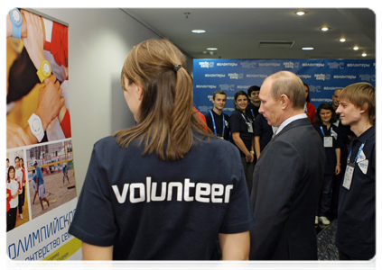 Prime Minister Vladimir Putin at the photo exhibition Russian Olympic Volunteers|7 december, 2010|16:30