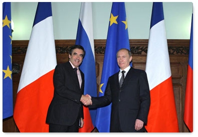 Prime Minister Vladimir Putin holds a limited attendance meeting with his French counterpart Francois Fillon