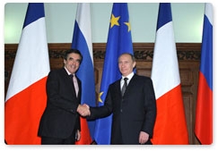 Prime Minister Vladimir Putin holds a limited attendance meeting with his French counterpart Francois Fillon