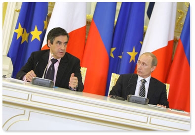 Russian Prime Minister Vladimir Putin and French Prime Minister Francois Fillon hold a joint news conference after the 15th session of the Russian-French commission on bilateral cooperation