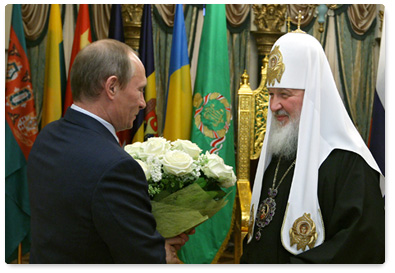 Prime Minister Vladimir Putin visits the Cathedral of Christ the Saviour to congratulate Patriarch Kirill of Moscow and All Russia on the anniversary of his enthronement