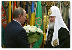 Prime Minister Vladimir Putin visits the Cathedral of Christ the Saviour to congratulate Patriarch Kirill of Moscow and All Russia on the anniversary of his enthronement