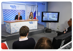 Prime Minister Vladimir Putin speaking with the Russian Olympic team at the Russian House in Vancouver during a video conference at the Olympic Information Centre, Sochi 2014|11 february, 2010|22:26