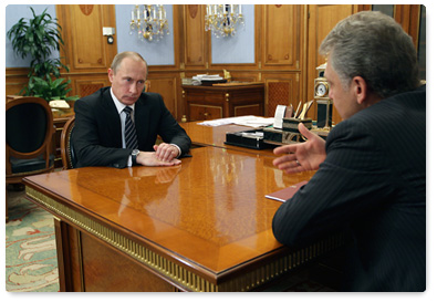 Prime Minister Vladimir Putin meets with Minister of Industry and Trade Viktor Khristenko