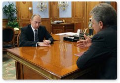 Prime Minister Vladimir Putin meets with Minister of Industry and Trade Viktor Khristenko