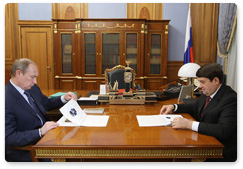 Prime Minister Vladimir Putin meets with Transport Minister Igor Levitin