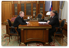 Prime Minister Vladimir Putin meets with Russian Railways President Vladimir Yakunin