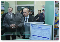 Prime Minister Vladimir Putin visits an outpatient clinic in Ufa that uses modern information technologies