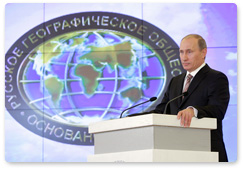 Prime Minister Vladimir Putin attends a meeting of the trustees of the Russian Geographical Society