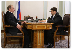 Prime Minister Vladimir Putin meets with Transport Minister Igor Levitin