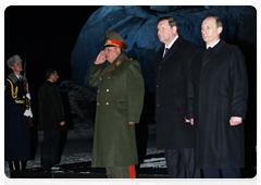 Russian Prime Minister Vladimir Putin and Belarusian Prime Minister Sergei Sidorsky laying flowers at Eternal Flame at Brest Hero Fortress war memorial|16 march, 2010|22:36