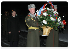 Russian Prime Minister Vladimir Putin and Belarusian Prime Minister Sergei Sidorsky laying flowers at Eternal Flame at Brest Hero Fortress war memorial|16 march, 2010|22:46