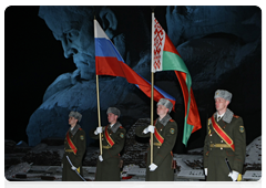 Russian Prime Minister Vladimir Putin and Belarusian Prime Minister Sergei Sidorsky laying flowers at Eternal Flame at Brest Hero Fortress war memorial|16 march, 2010|22:48