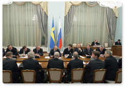 Prime Minister Vladimir Putin meets with Swedish Prime Minister Fredrik Reinfeldt