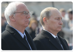 Vladimir Putin and Polish Ambassador to Russia Jerzy Bar at the memorial service for Lech Kaczynski, who died in a plane crash near Smolensk|11 april, 2010|16:19