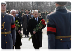 Vladimir Putin and Polish Ambassador to Russia Jerzy Bar at the memorial service for Lech Kaczynski, who died in a plane crash near Smolensk|12 april, 2010|09:29