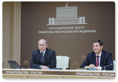 Prime Minister Vladimir Putin discusses preparations for the 2014 Olympic Games in Sochi with representatives of the Coordination Commission of the International Olympic Committee (IOC) during a videoconference in the government’s situation centre