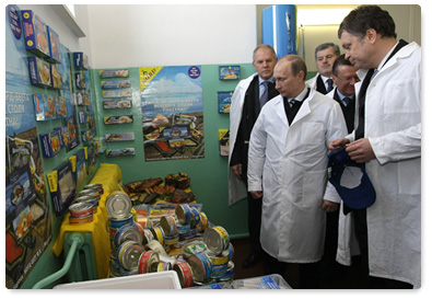 Prime Minister Vladimir Putin visits one of northwestern Russia’s largest fish processing plants during a working trip to the Murmansk Region